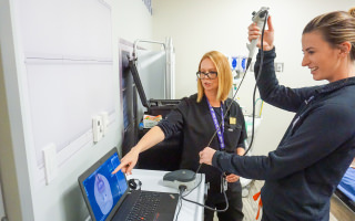 TCU faculty and student in simulation lab