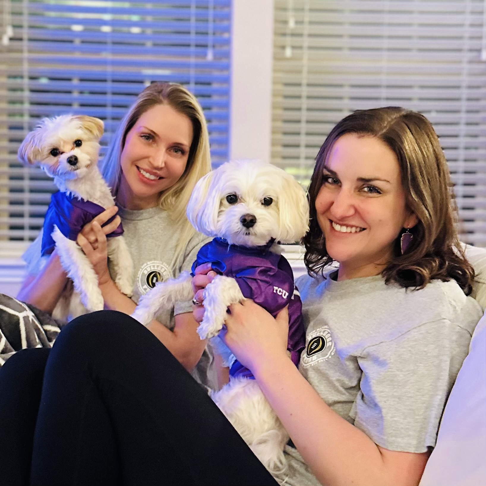 Diana and her friend showing their TCU dressed puppies