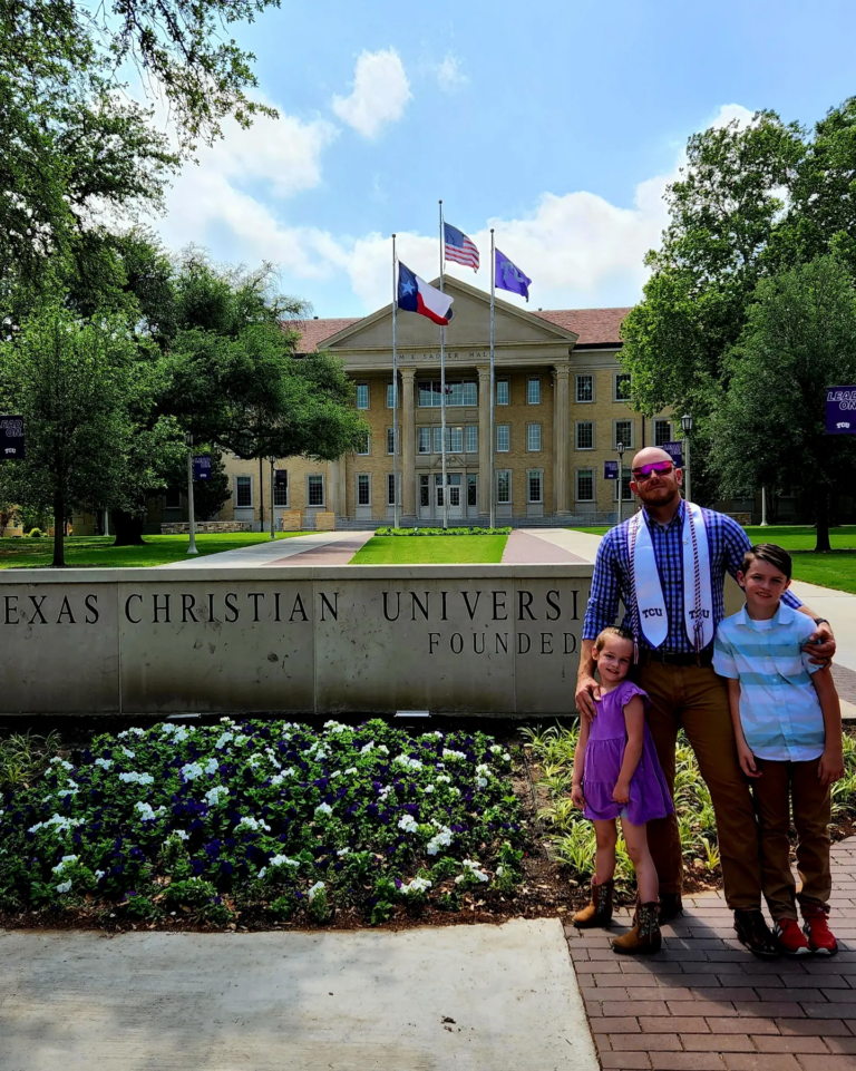 Arrow pictured with his children, Mason and Aila on his graduation day.