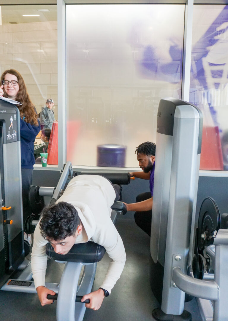 Student working out at the TCU rec center